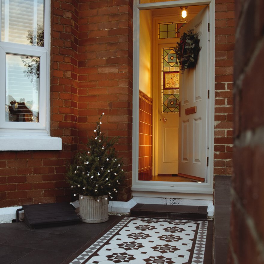 Creating a Festive Entranceway with Artworks and Victorian Floor Tiles