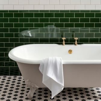 Vintage White Half Tile (above) Edwardian Green Albert Dado and Vintage White Half Tile (middle) Edwardian Green Skirting Tile (below) Porcelain White Black Hexagon Checker (floor)