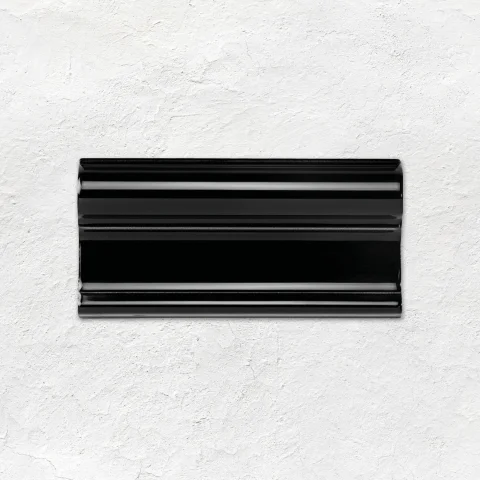 Jet Black Victoria Dado and Jet Black Victorian Dental (above) Victorian Green Field Tile (middle) Jet Black Skirting Tile (below) Lignum Beige Natural (floor)