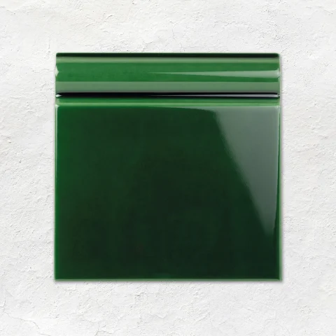 Victorian Green Field Tile (above) Victorian Green Skirting Tile (below) Saint-Vallier Tumbled Limestone (floor)