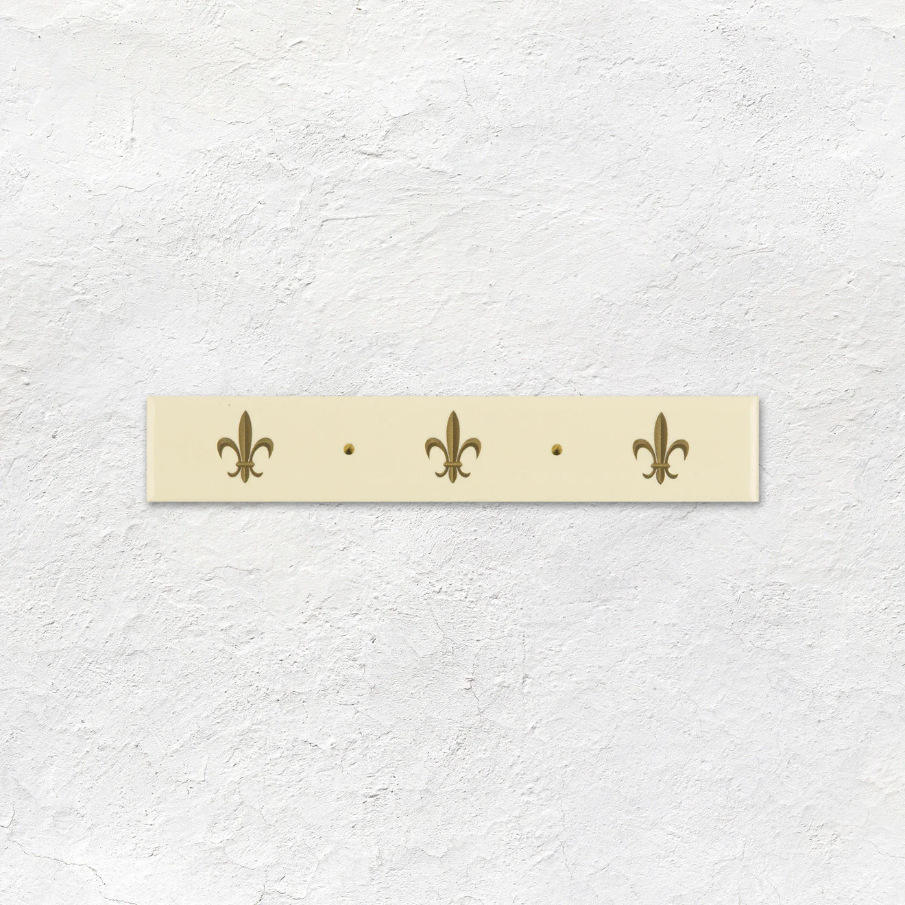 Colonial White Field Tile (above) Colonial White Omega Dado and Gold Fleur De Lis set/2 On Colonial White (middle) Gold Fleur De Lis On 6x1 Colonial White (below)
