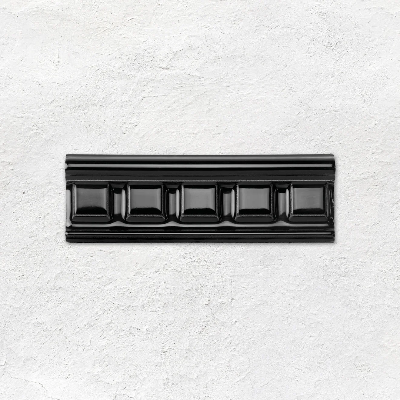 Jet Black Victoria Dado and Jet Black Victorian Dental (above) Victorian Green Field Tile (middle) Jet Black Skirting Tile (below) Lignum Beige Natural (floor)