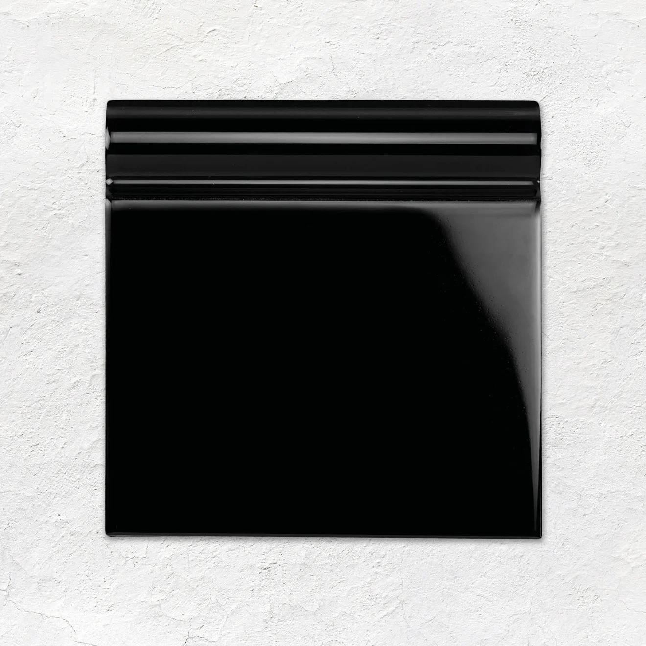 Brilliant White Field Tile (above) Jet Black Skirting (below) and Harlequin Large Black on Chalk (floor)