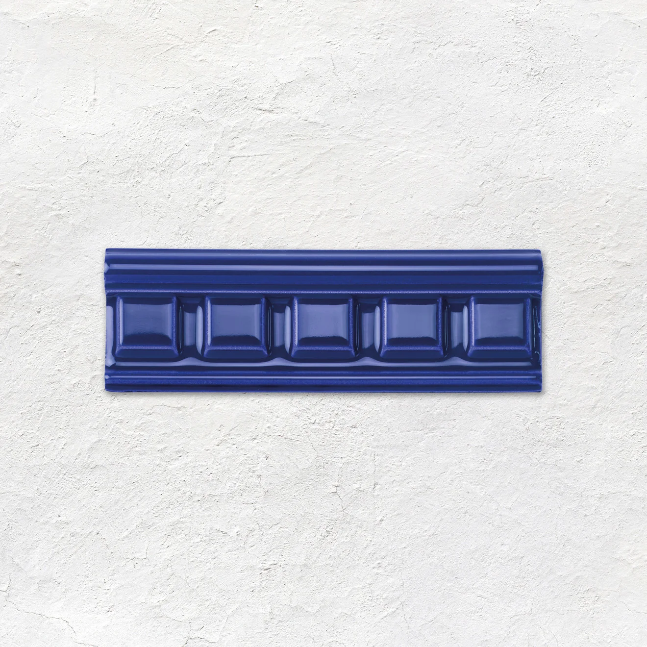 Brilliant White Half Tile (above) Royal Blue Dentil Dado, Brilliant White Omega Dado and Royal Blue Parthenon on Brilliant White (middle) Brilliant White Field Tile (below)