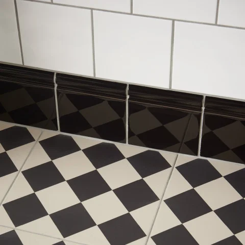 Brilliant White Field Tile (above) Jet Black Skirting (below) and Harlequin Large Black on Chalk (floor)
