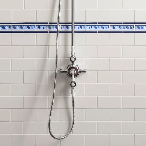 Brilliant White Half Tile (above) Royal Blue Omega Dado and Royal Blue Greek Key On Brilliant White (middle) Brilliant White Half Tile (below)