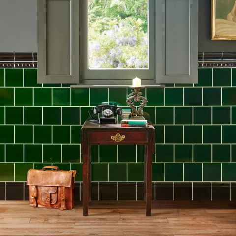 Jet Black Victoria Dado and Jet Black Victorian Dental (above) Victorian Green Field Tile (middle) Jet Black Skirting Tile (below) Lignum Beige Natural (floor)
