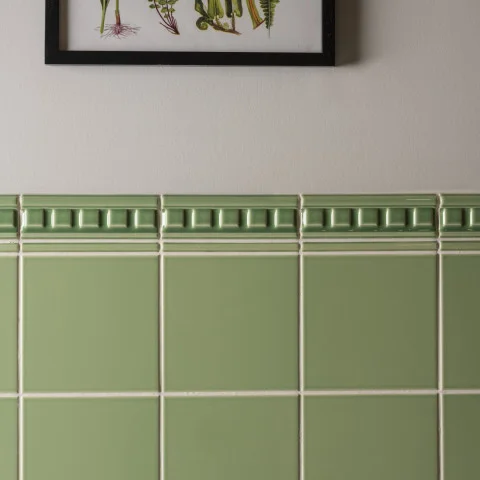 Palm Green Dentil Dado and Palm Green Omega Dado (above) Palm Green Field Tile (below)