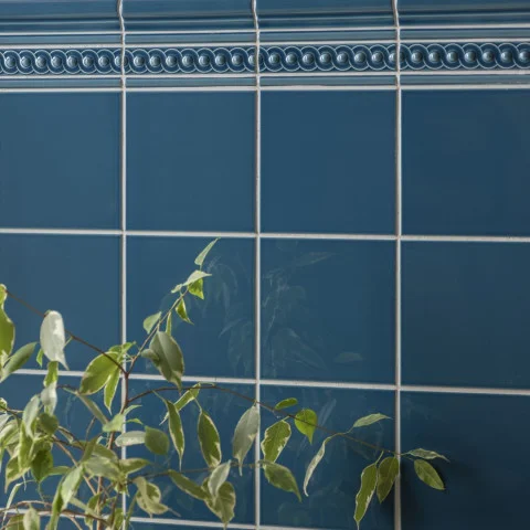 Baroque Blue Albert Dado, Baroque Blue Scroll Dado and Baroque Blue Omega Dado (above) Baroque Blue Field Tile (below)