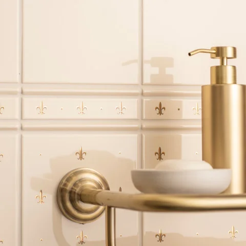 Colonial White Field Tile (above) Colonial White Omega Dado and Gold Fleur De Lis set/2 On Colonial White (middle) Gold Fleur De Lis On 6x1 Colonial White (below)